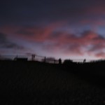 The sun setting behind the dune.