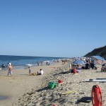 A view down the beach, past the lifeguard stand.